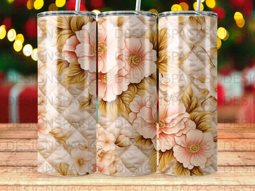 Floral pattern tumbler with pink flowers and gold leaves, on white background.