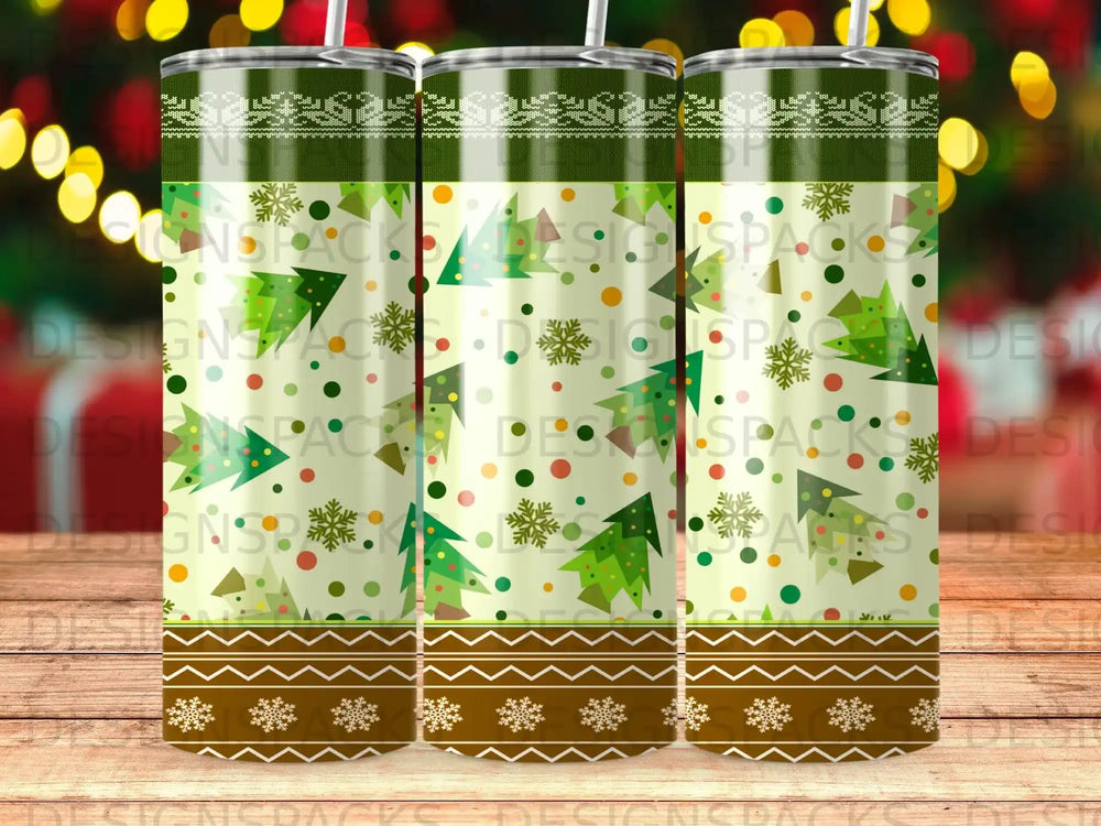 Patterned tumbler with green Christmas trees and snowflakes on a white background.