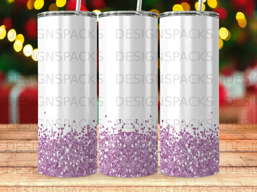 Three tumblers with purple glitter gradient and repeating "DESIGNSPACKS" text.