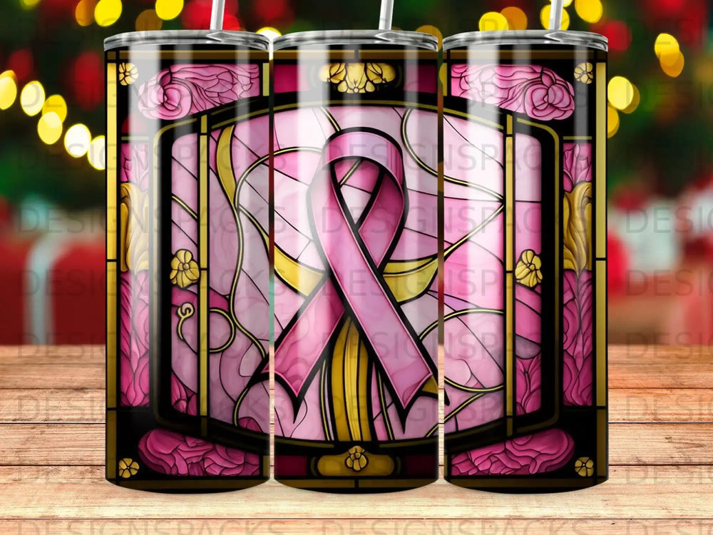 Pink ribbon in stained glass pattern on tumbler, with festive bokeh lights.