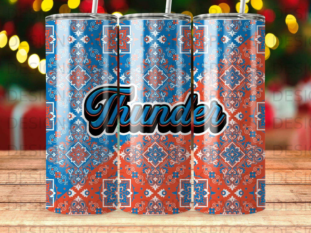 Blue and orange paisley pattern tumbler with "Thunder" text.
