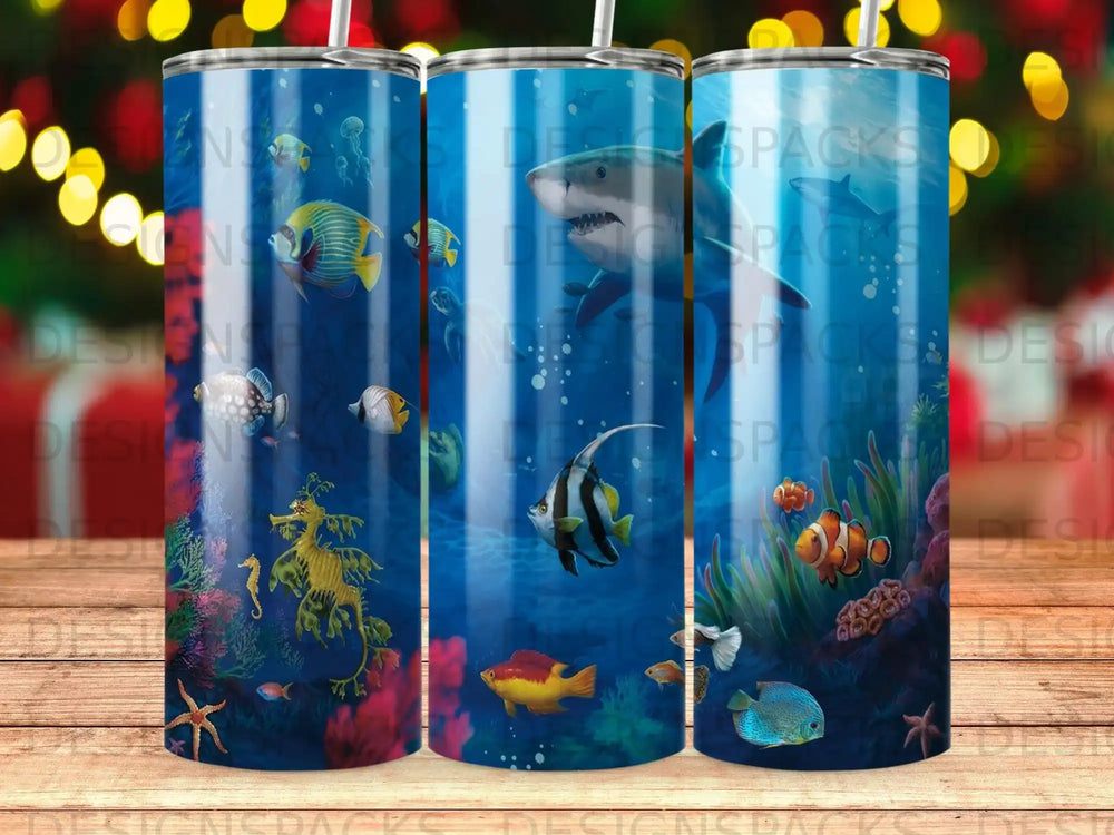 Ocean scene with fish, seahorse, and coral on a tumbler.