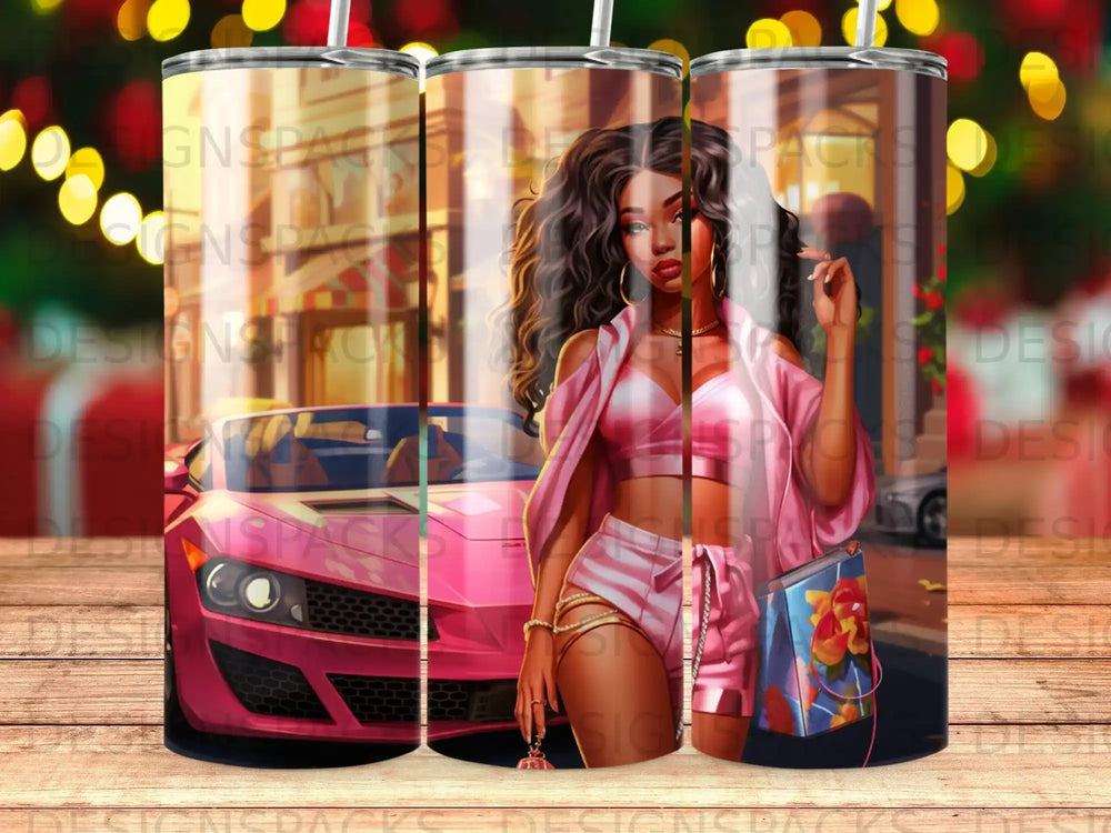 Woman in pink outfit posing with a pink sports car.