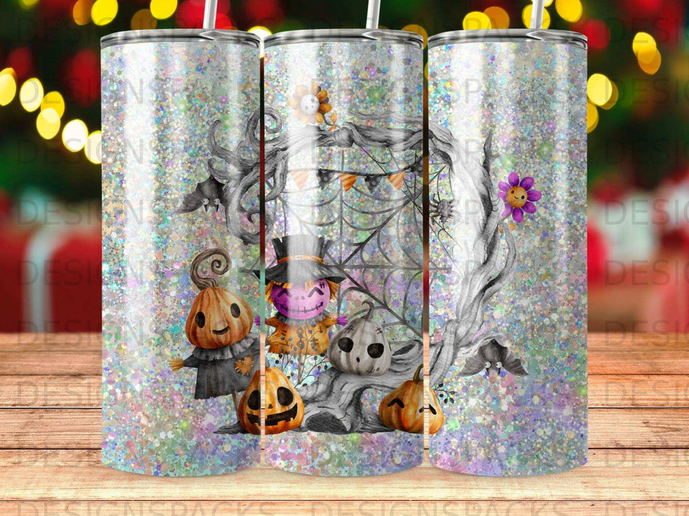 Glittery Halloween tumbler with pumpkins, scarecrow, bats, and spiderwebs.
