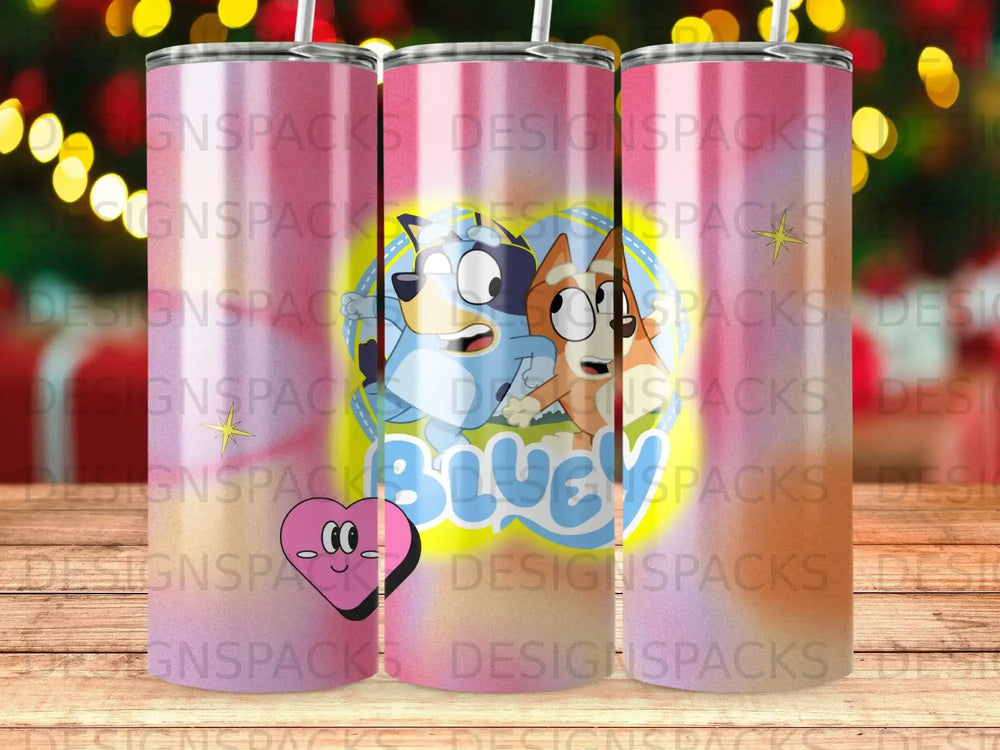 Bluey and Bingo cartoon characters on a gradient pink and blue tumbler.