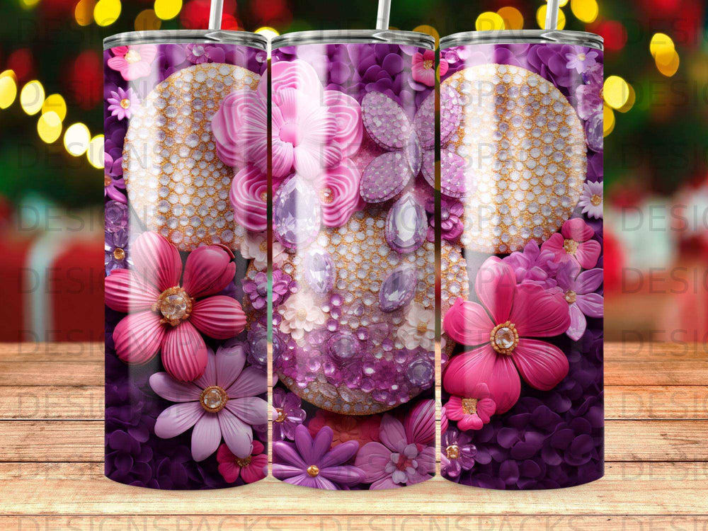 Tumbler with purple floral design and sparkling jewel accents.