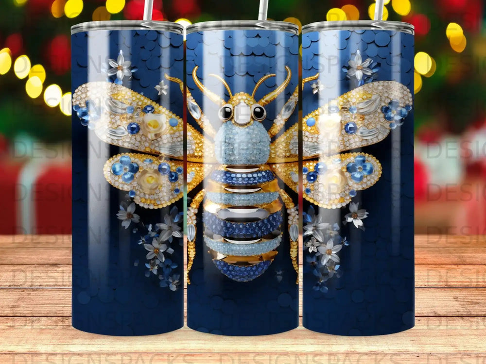 Bee with blue and gold wings adorned with rhinestones on a dark blue background.