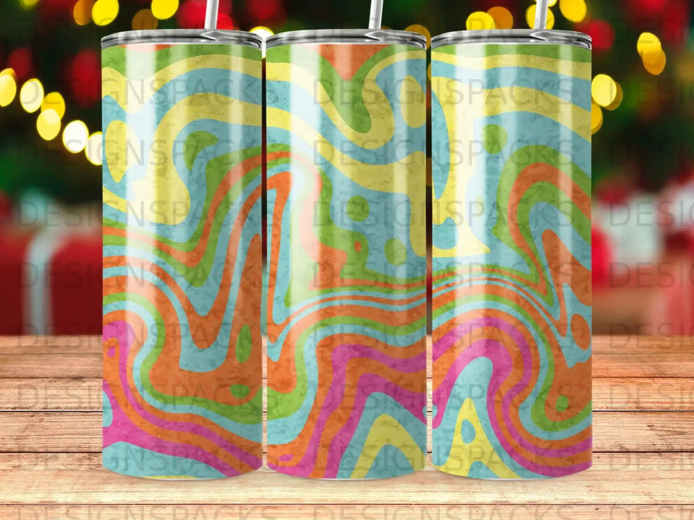 Three tumblers with a colorful, retro wavy pattern.