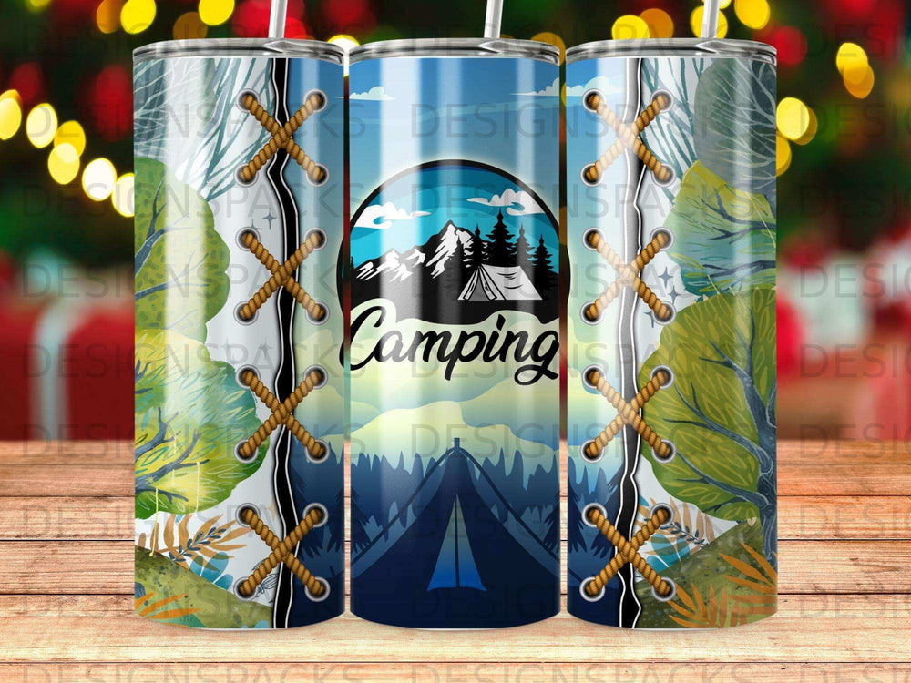 Tumbler with a camping scene featuring mountains, trees, and a tent.