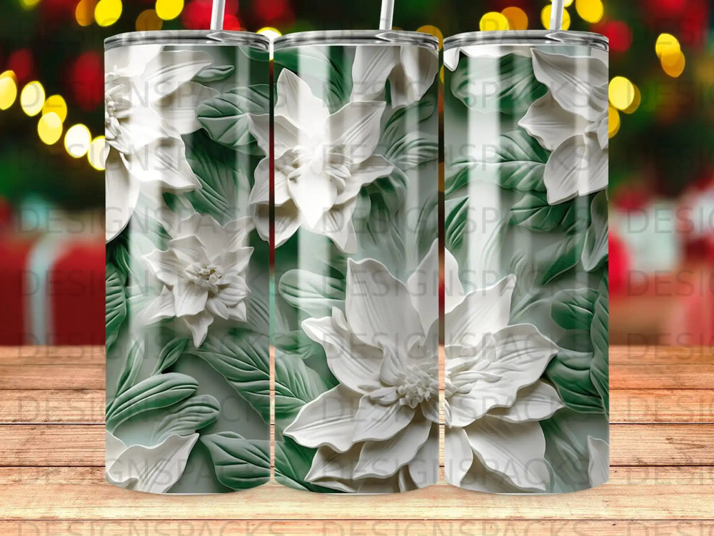 Three tumblers featuring raised white floral and green leaf designs.