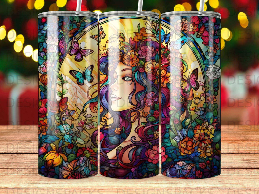 Woman's face with flowing colorful hair surrounded by flowers and butterflies.