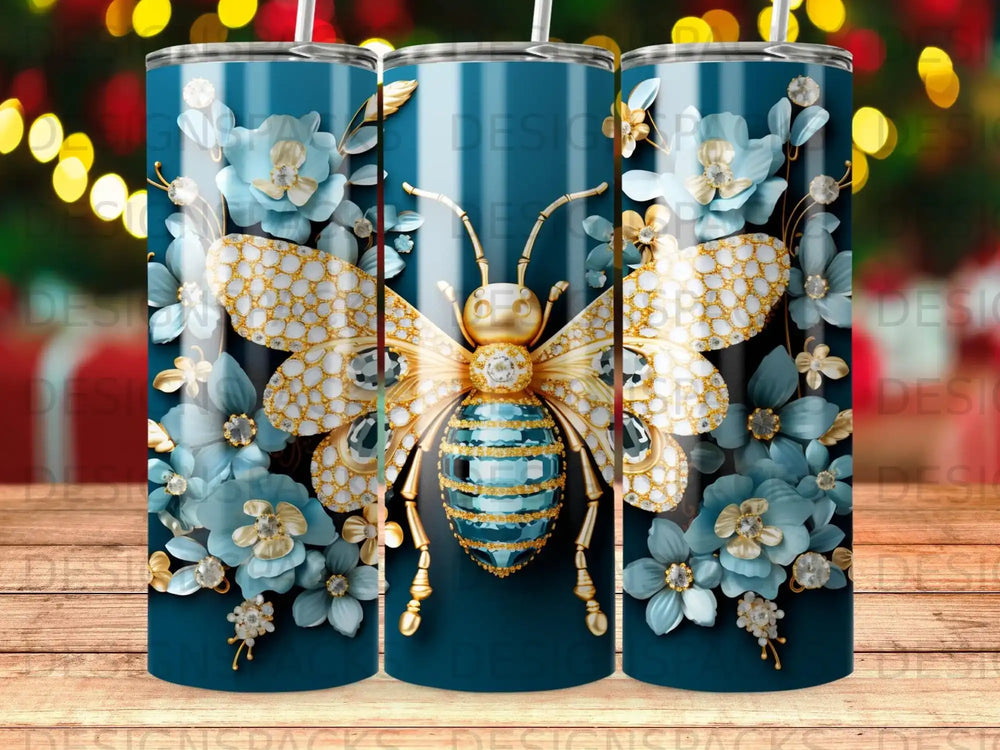 Gold and blue bee with flowers on a dark blue tumbler.