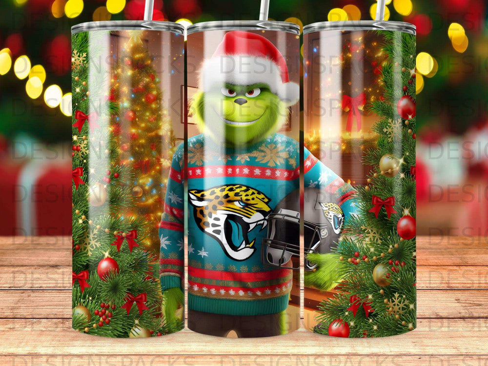 Grinch in ugly Christmas sweater holding a camera with a Christmas tree background.