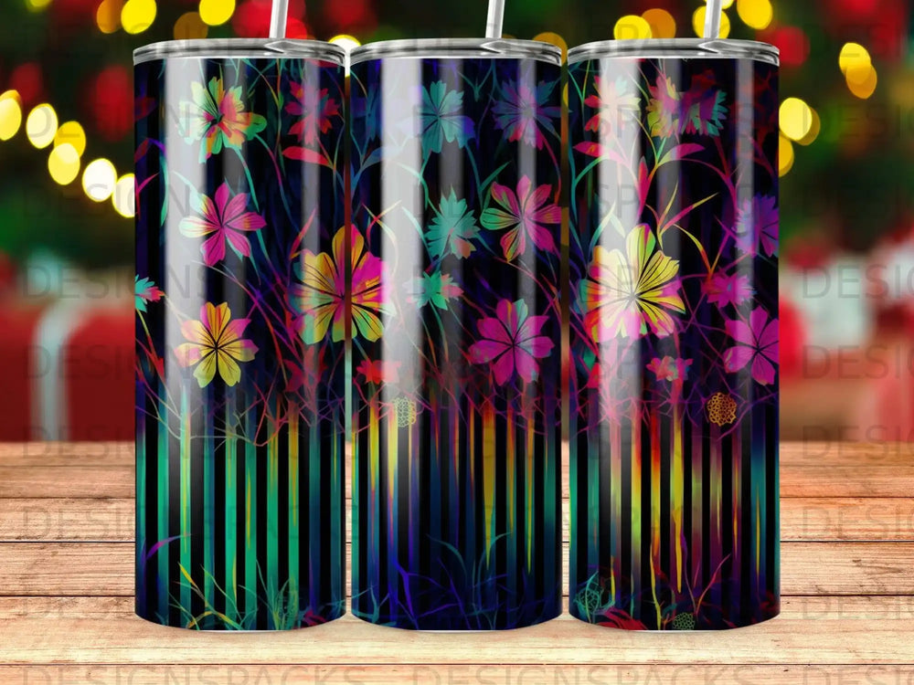 Striped tumbler with colorful floral pattern and glowing bokeh background.