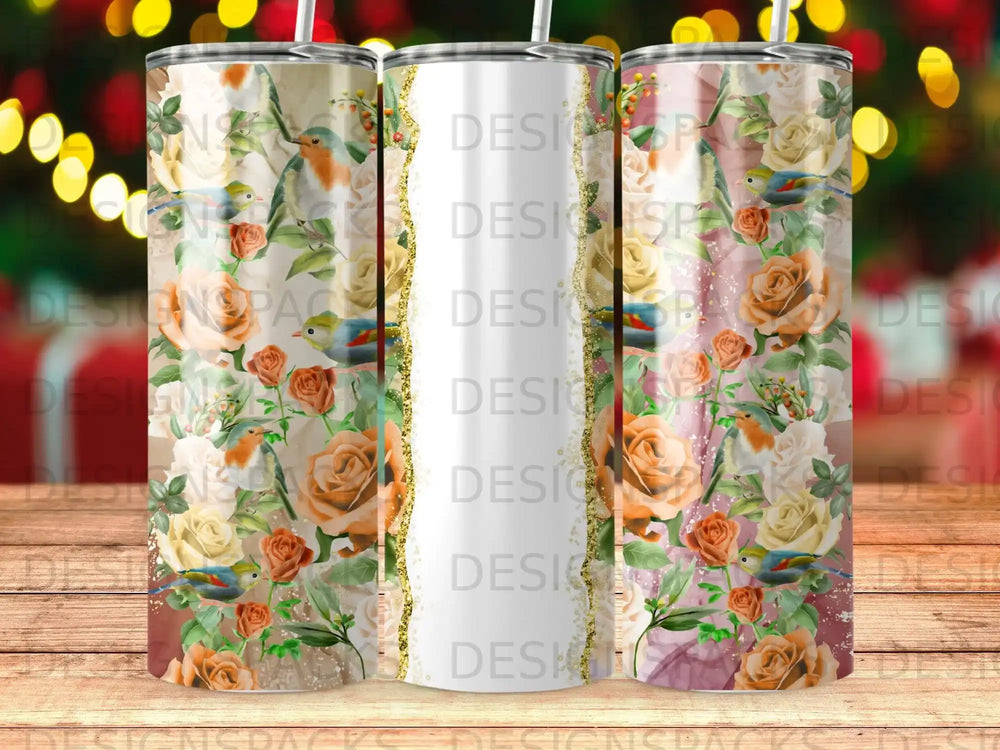Three tumblers with a floral and bird design.