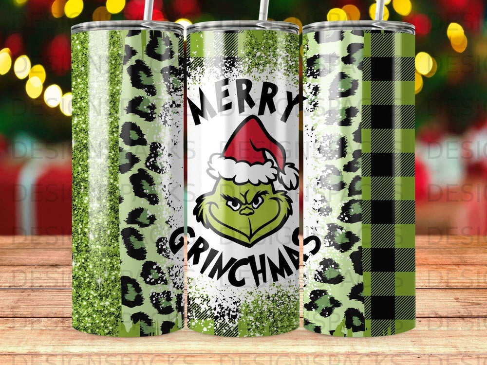 Grinch wearing Santa hat on a tumbler with green plaid and glitter.