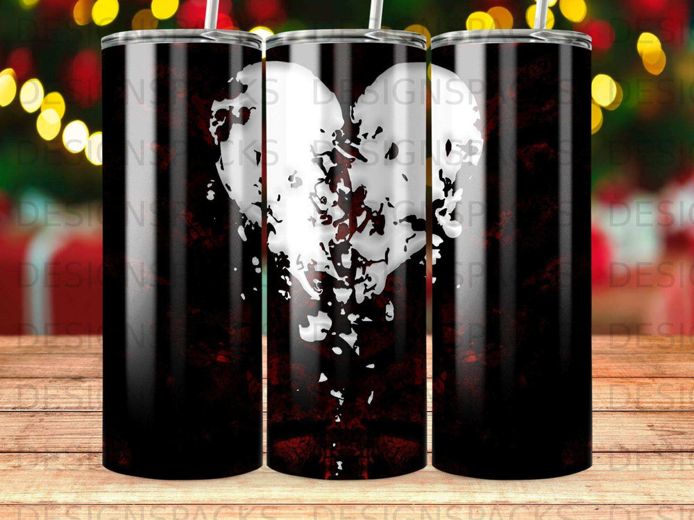 Black tumbler with a distressed white heart design.