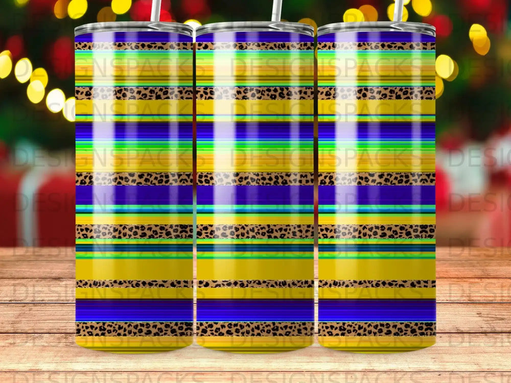 Colorful striped tumbler with leopard print accents and a blue top.