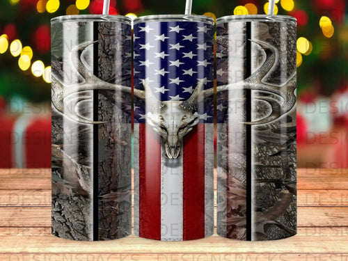 Tumbler with American flag, skull with antlers, and camouflage.