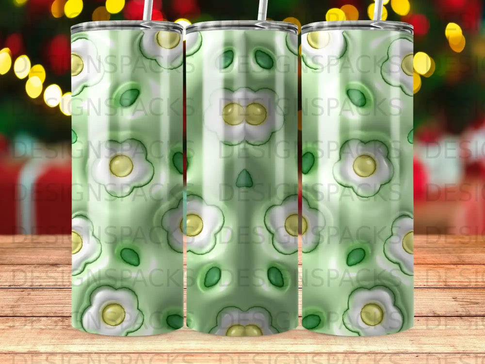 Green tumbler with white and yellow floral pattern, repeating logo.