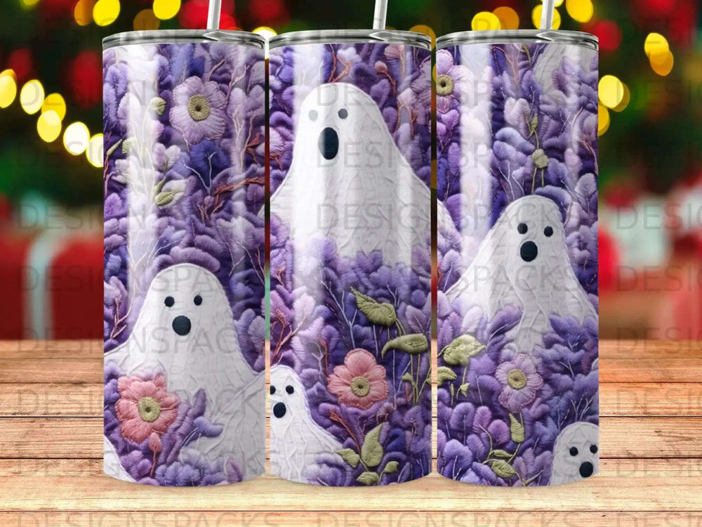 Halloween tumbler with ghosts and purple floral pattern.