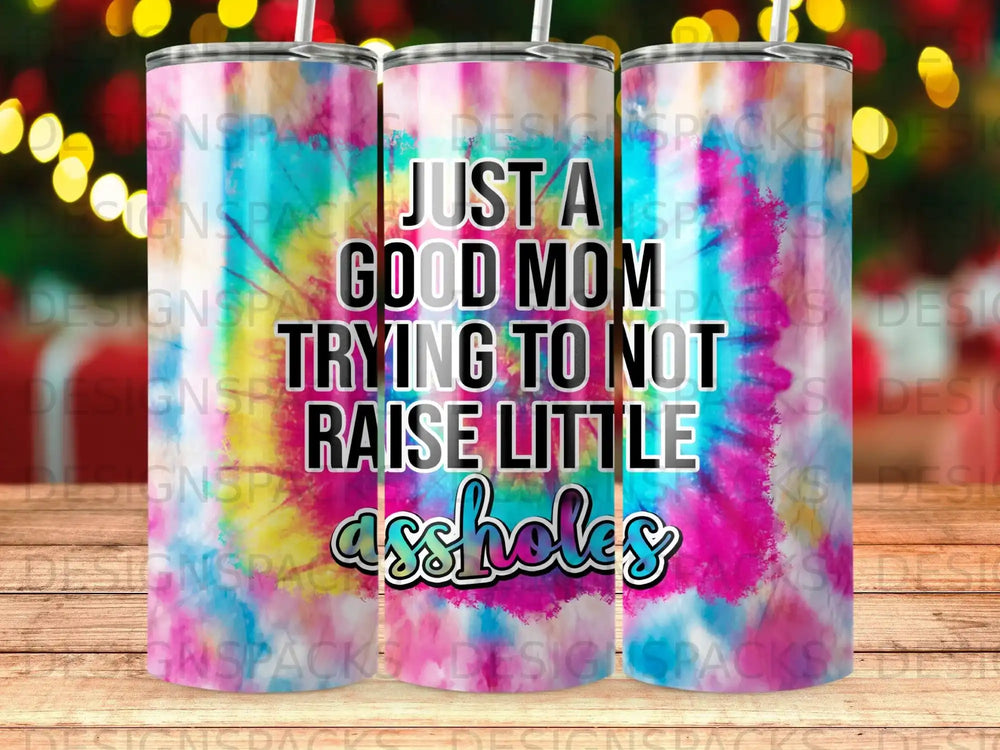 Tie-dye tumbler with text "Just a good mom trying to not raise little assholes".