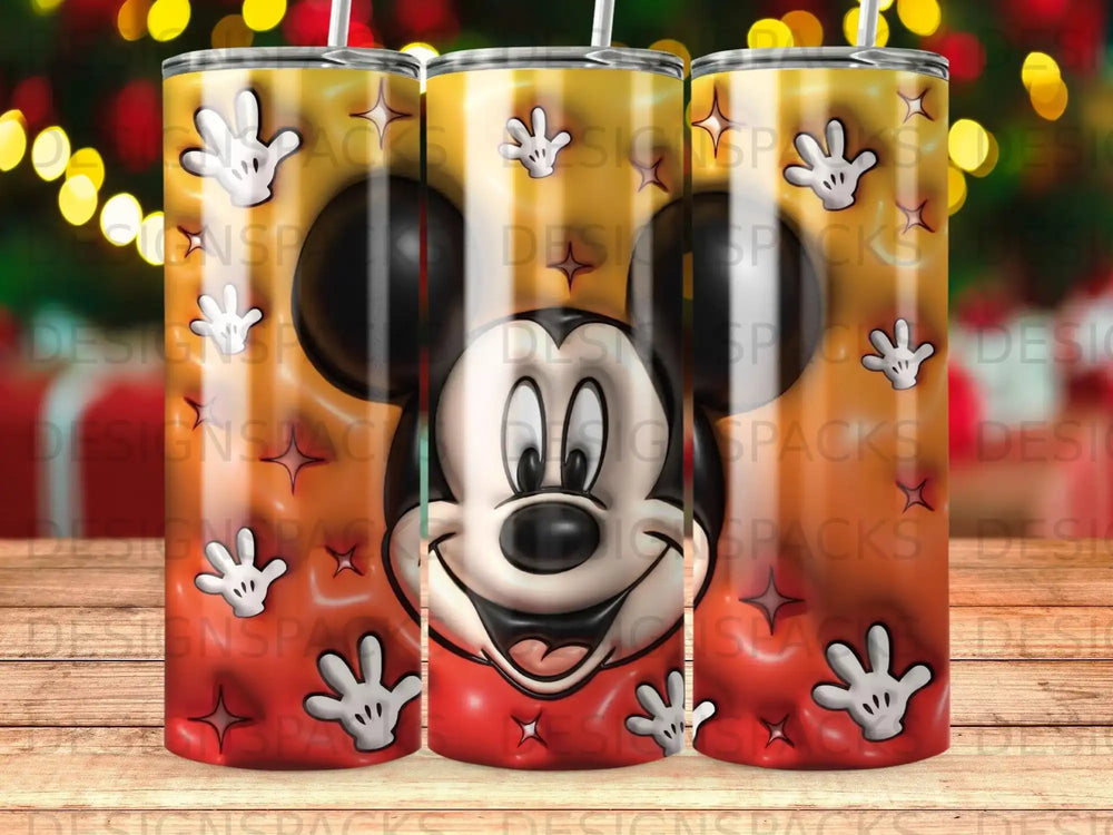 Mickey Mouse face with warm gradient background on three tumblers.