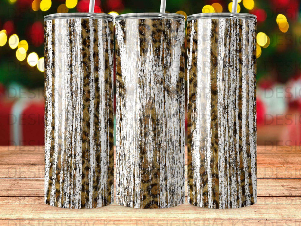 Three tumblers with leopard print and wood grain texture patterns.