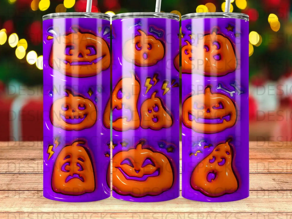 Halloween tumbler with jack-o'-lanterns and bones on purple background.