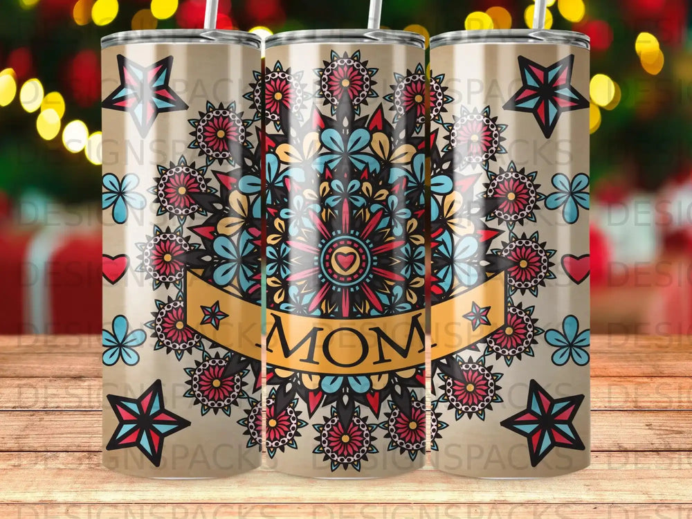 Colorful mandala design with stars and "MOM" banner on a beige tumbler.