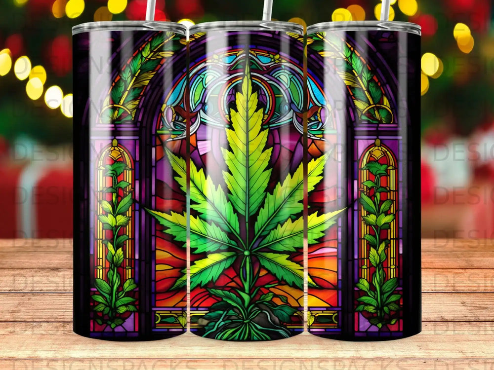 Stained glass tumbler featuring a cannabis leaf motif.