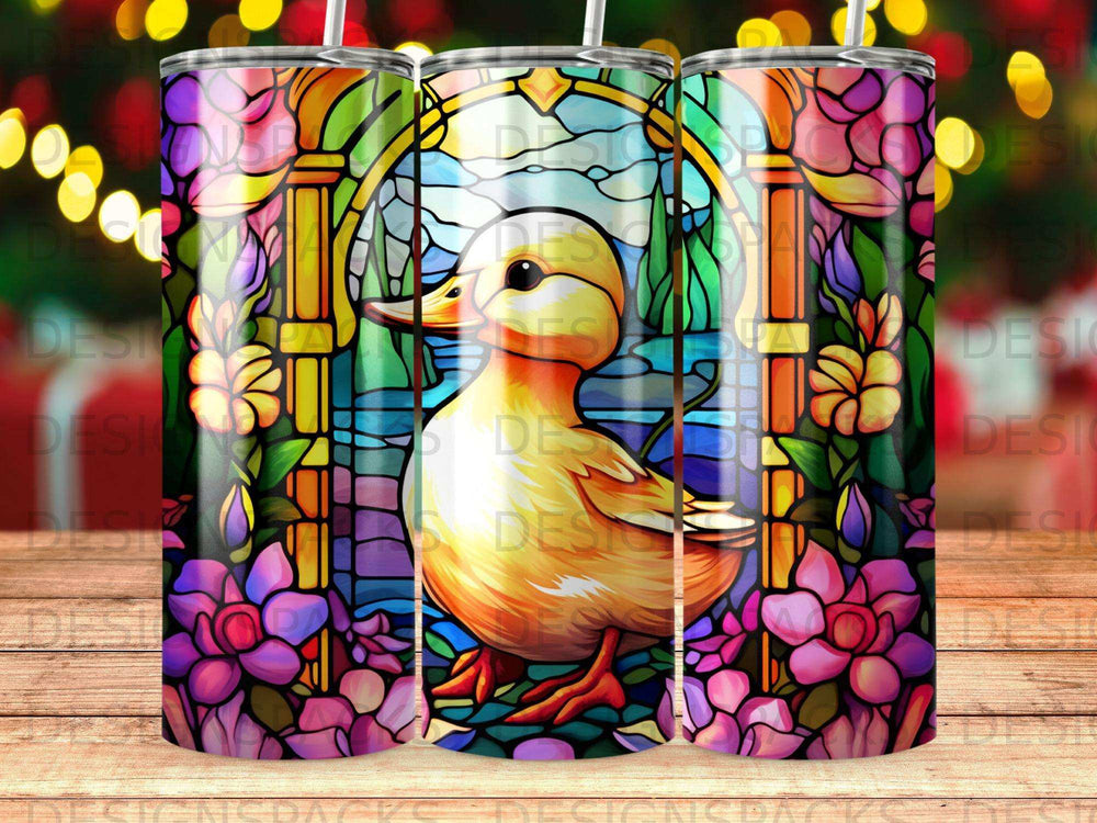 Yellow duckling in stained glass window with floral border.