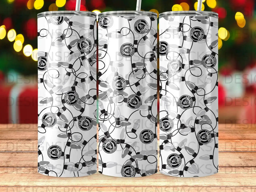 Black and white Las Vegas Raiders logo and Christmas lights pattern on a tumbler.