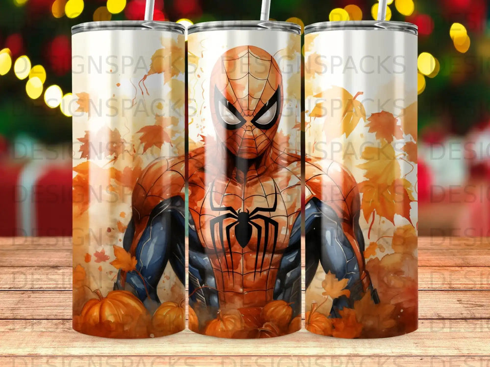 Spiderman against autumn leaves and pumpkins on a tumbler design.