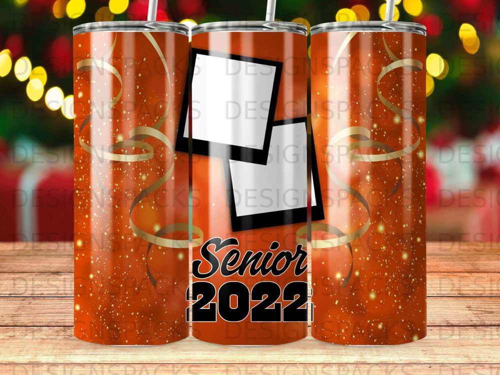 Tumbler with "Senior 2022" and two photo frames on orange glitter background.