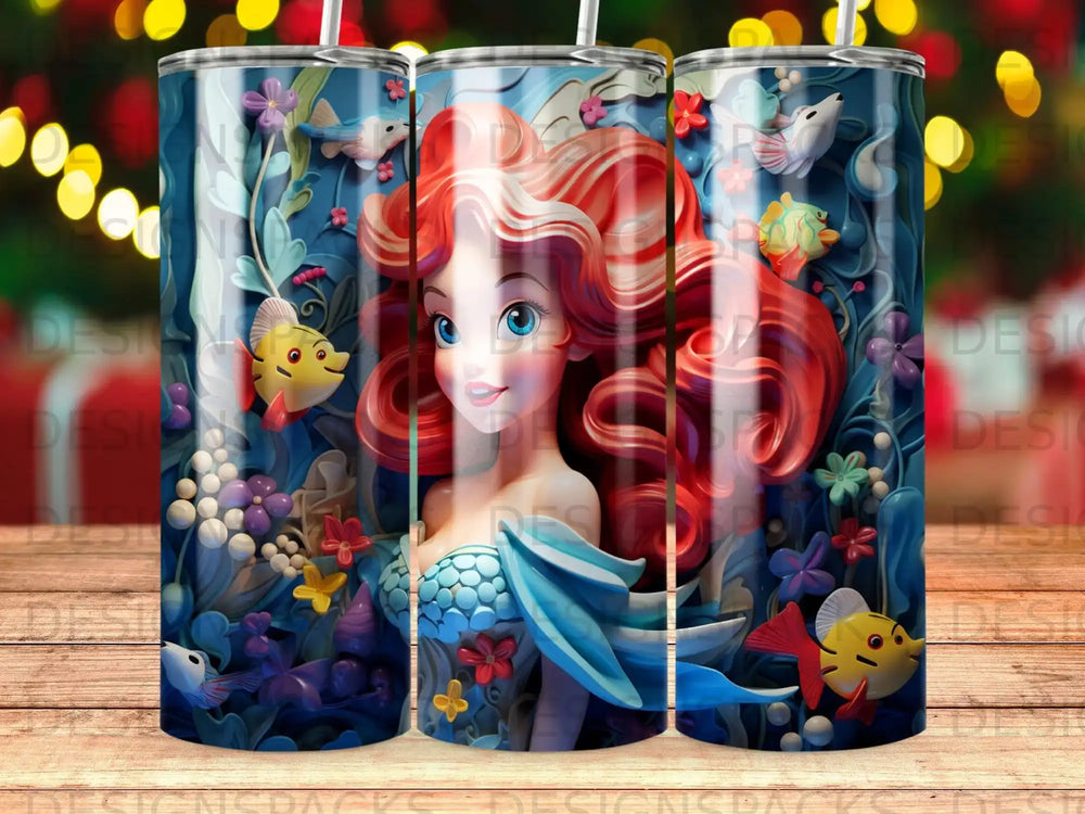 Ariel the Little Mermaid on a blue tumbler with fish and coral.