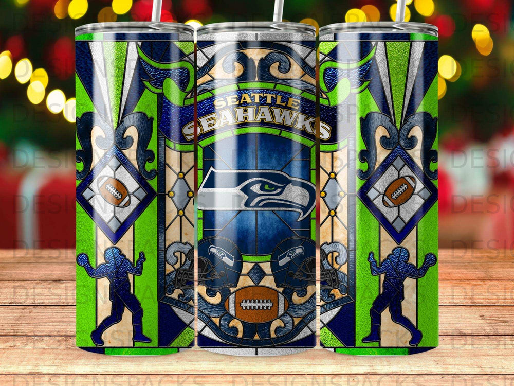 Seattle Seahawks logo on a tall, green and blue patterned tumbler with football graphics.