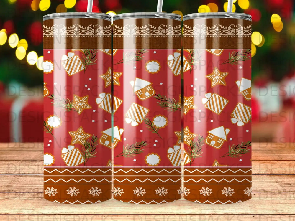 Red tumbler with gingerbread houses, snowflakes, and Christmas tree ornaments.