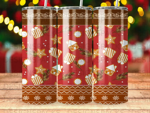 Red tumbler with gingerbread houses, snowflakes, and Christmas tree ornaments.