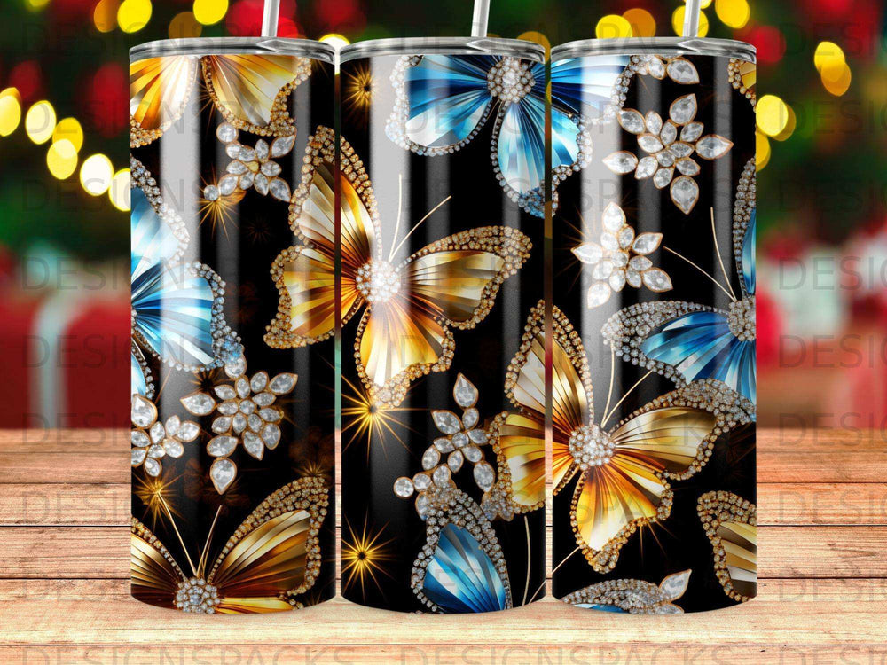 Tumbler with blue and gold butterflies and sparkling diamond-like accents.