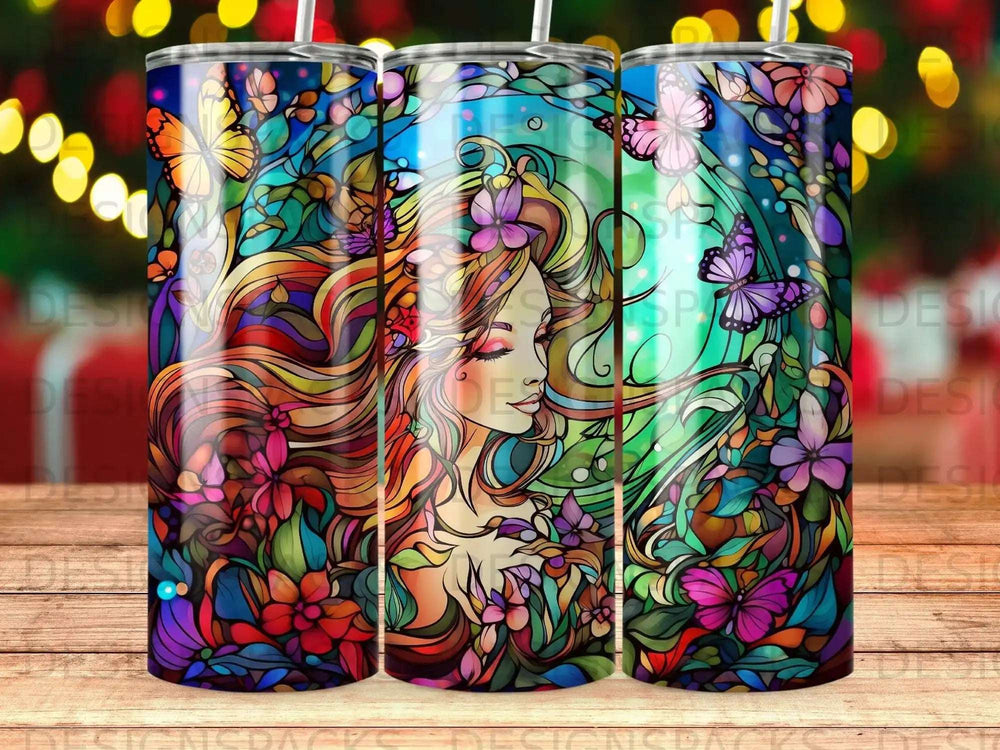 Fantasy tumbler with woman's profile, vibrant flowers, and butterflies.