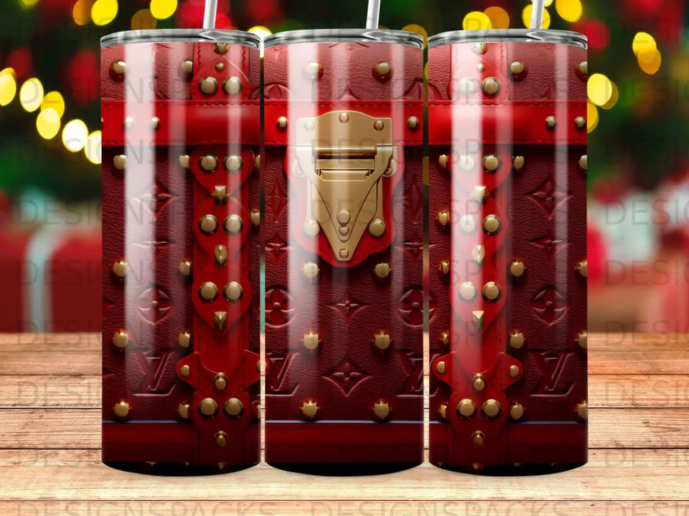 Red faux leather tumbler with gold studs and buckle detail.