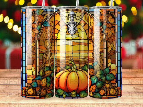 Stained glass tumbler with pumpkin, autumn leaves, and window design.