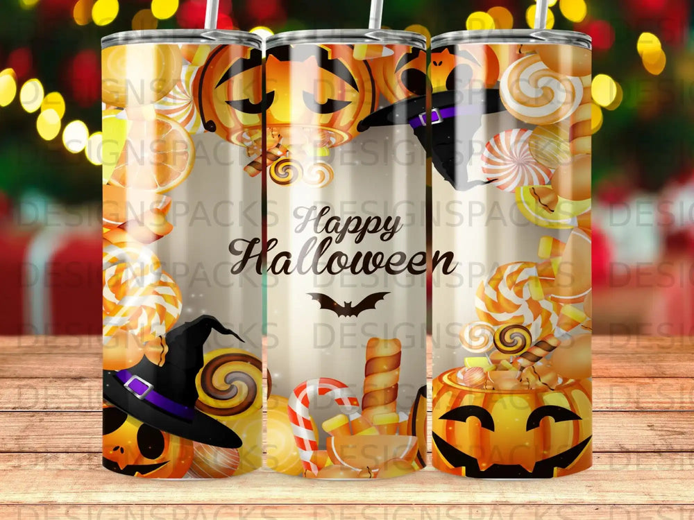 Halloween tumbler with pumpkins, candy, and witch hats.