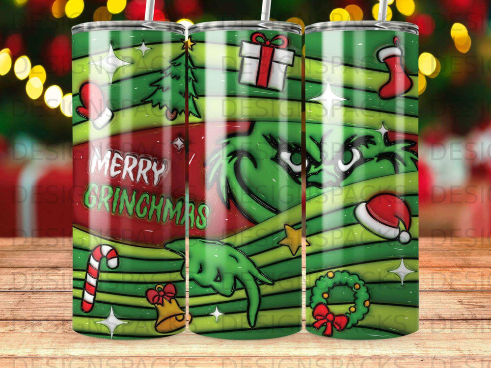 Green Grinch Merry Grinchmas tumbler with holiday decorations.