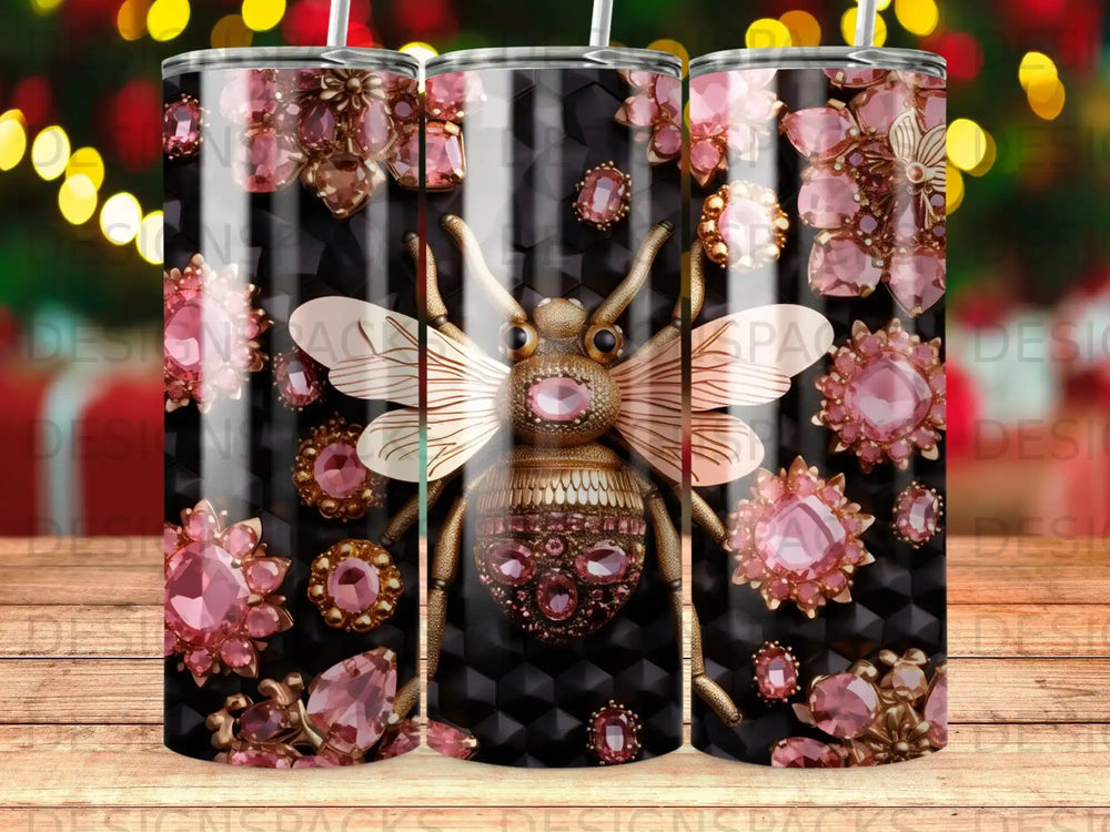 Bee design with pink jewels on a black striped tumbler.