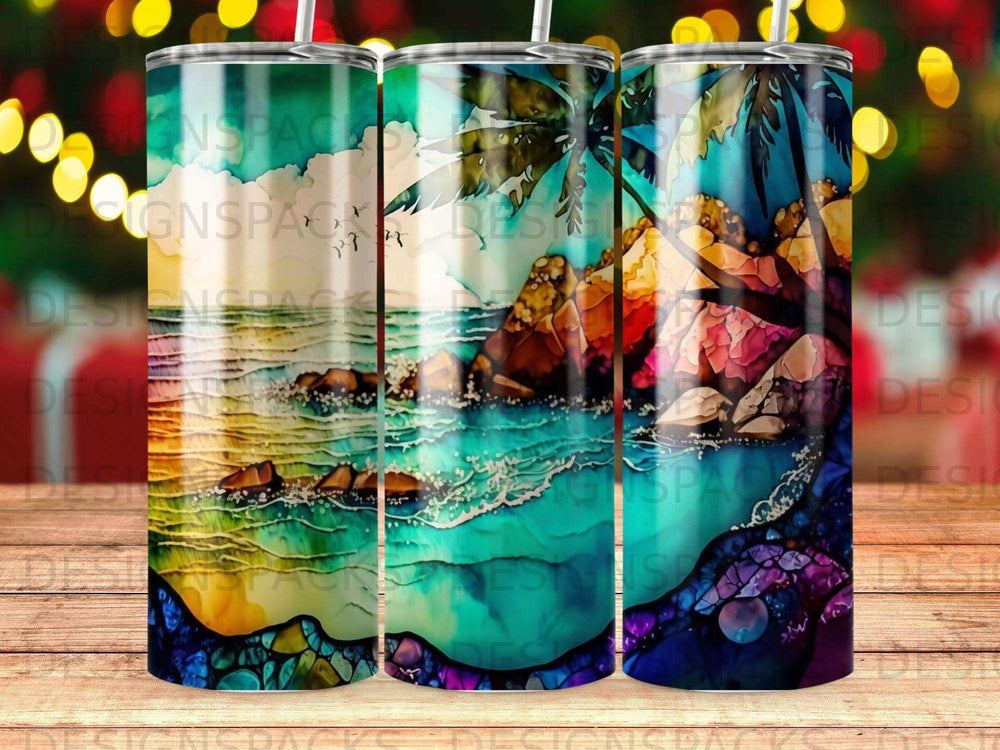 Three tumblers with a vibrant tropical beach scene and palm trees.