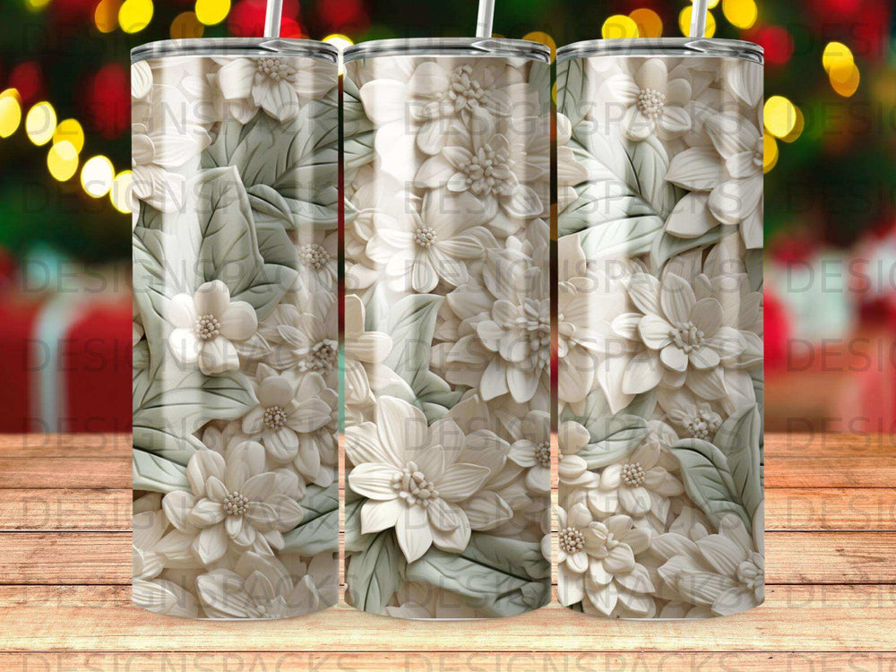 Floral embossed tumbler with a background of blurred lights.