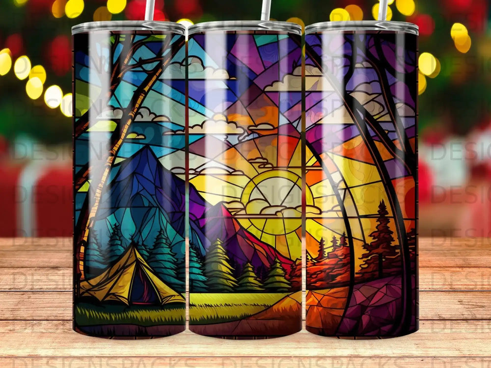 Stained glass landscape with tent, mountains, trees, and sun.