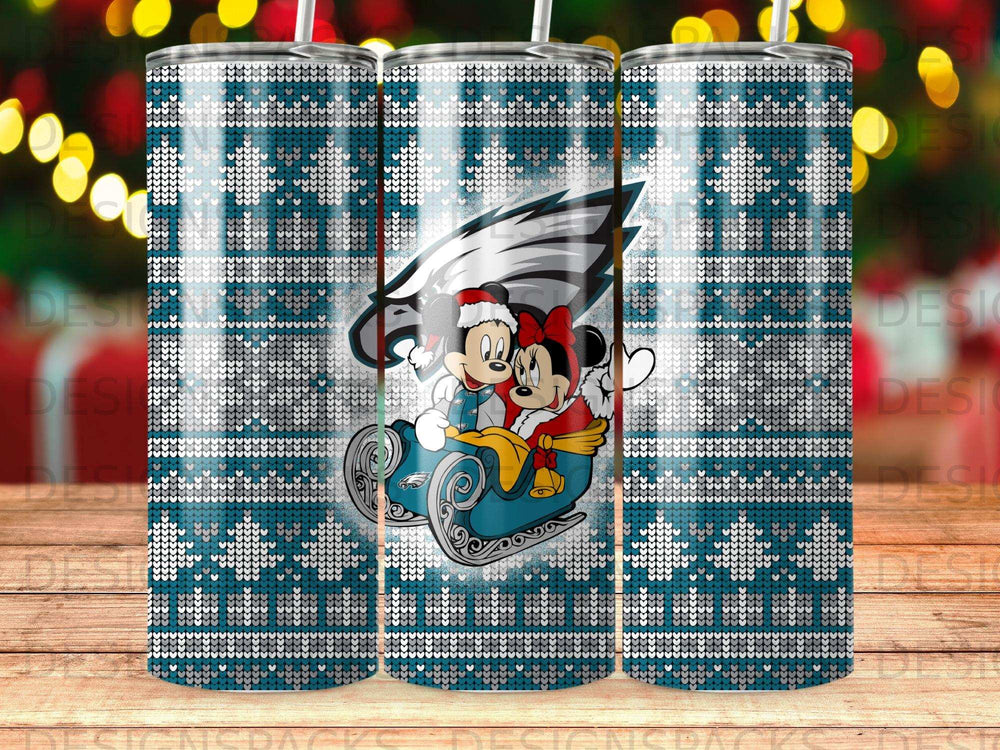 Mickey and Minnie Mouse in a sleigh with the Philadelphia Eagles logo on a teal snowflake background.